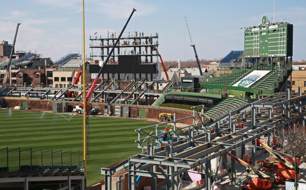 Construction of the bleachers and a video board resumes at Wrigley Field Tuesday, March 31, 2015, in Chicago.(John J. Kim/Chicago Tribune)