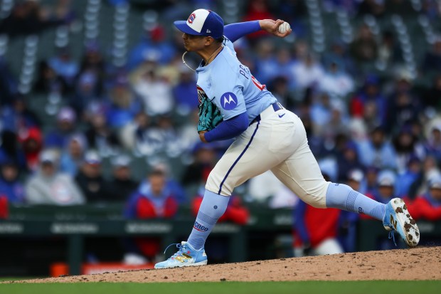 Chicago Cubs pitcher Daniel Palencia (48) pitches during the ninth inning of a game against the Philadelphia Phillies at Wrigley Field on Friday, April 25, 2025, in Chicago. (Audrey Richardson/Chicago Tribune)