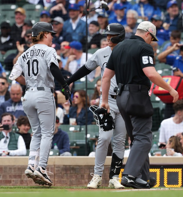 White Sox shortstop Chase Meidroth crosses the plate after hitting a home run against the Cubs in the first inning on May 17, 2025, at Wrigley Field. (John J. Kim/Chicago Tribune)
