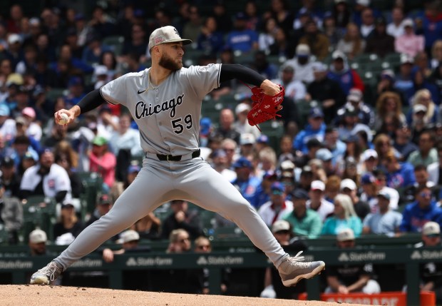 White Sox starter Sean Burke delivers against the Cubs in the first inning on May 17, 2025, at Wrigley Field. (John J. Kim/Chicago Tribune)