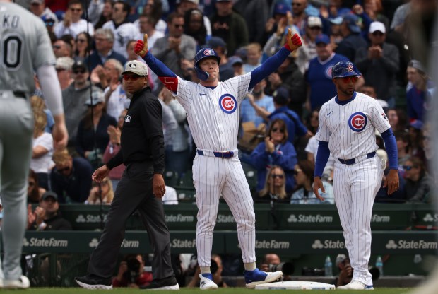 Cubs center fielder Pete Crow-Armstrong gestures to teammates after hitting a two-run single against the White Sox in the second inning on May 17, 2025, at Wrigley Field. (John J. Kim/Chicago Tribune)