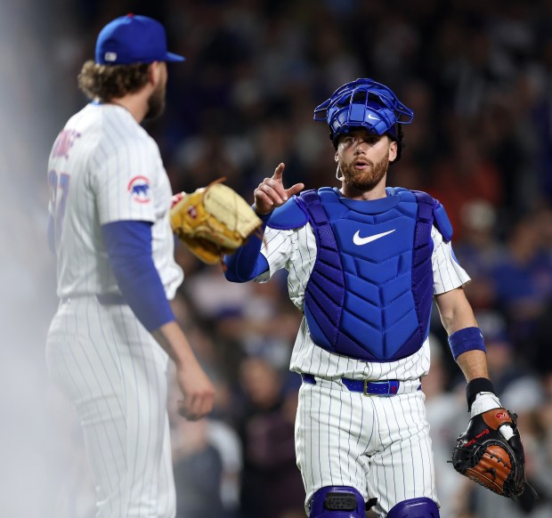 Cubs reliever Porter Hodge, left, and catcher Carson Kelly chat after shutting down the Giants in the 10th inning Tuesday, May 6, 2025, at Wrigley Field. (Chris Sweda/Chicago Tribune)