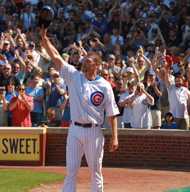 Chicago Cubs pitcher Kerry Wood acknowledges the crowd in the eighth inning of a game against the Chicago White Sox at Wrigley Field on May 18, 2012. (Phil Velasquez/Chicago Tribune)