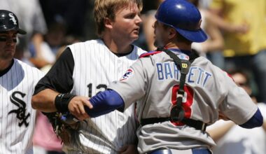 Cubs catcher Michael Barrett punches A.J. Pierzynski during the Crosstown Classic