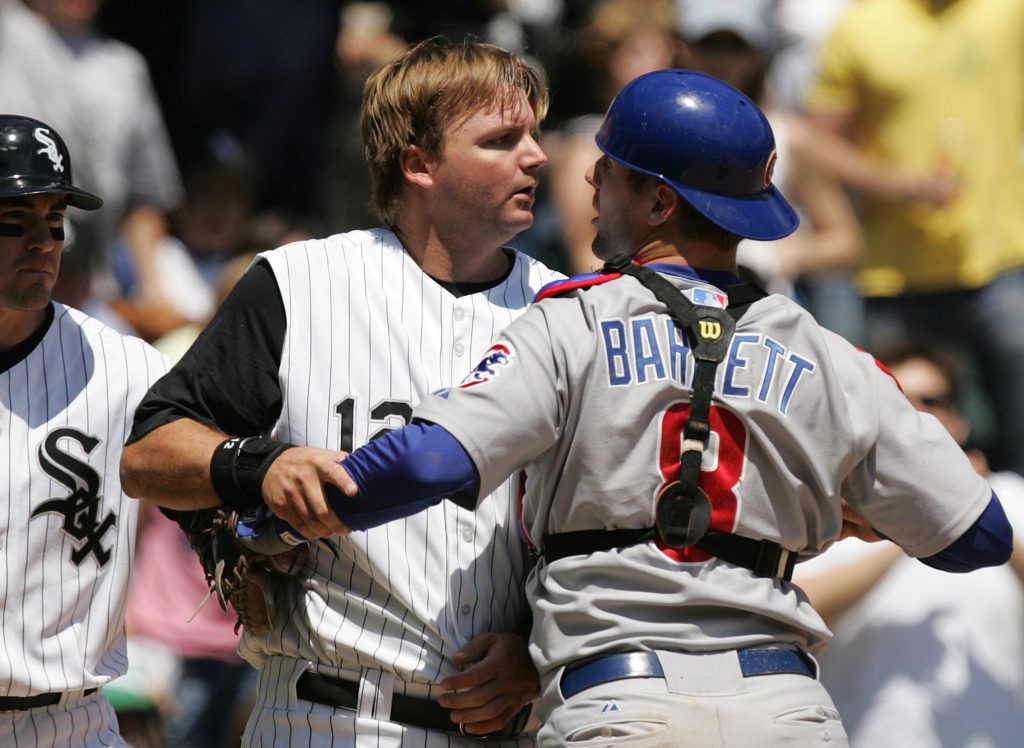 Cubs catcher Michael Barrett punches A.J. Pierzynski during the Crosstown Classic