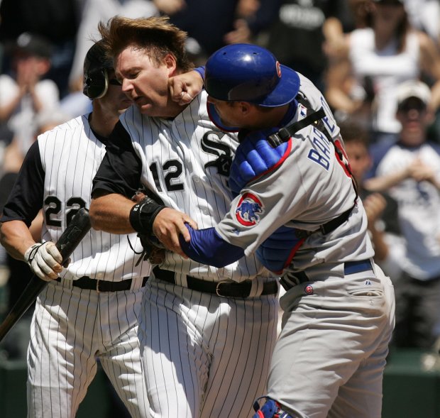 Michael Barrett, right, punches A.J. Pierzynski after Pierzynski plowed into the Chicago Cubs catcher in the second inning of a game at U.S. Cellular Field on May 20, 2006. The White Sox won 7-0. Four players were ejected from the game including Barrett and Pierzynski. (Phil Velasquez/Chicago Tribune)