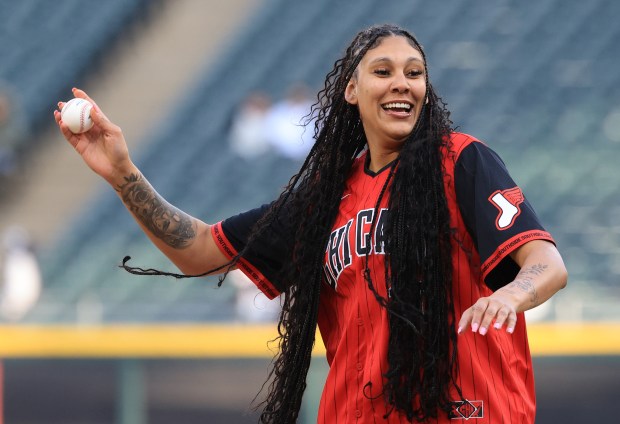 Chicago Sky player Kamilla Cardoso throws out a ceremonial first pitch before a White Sox-Rangers game at Rate Field on May 23, 2025, in Chicago. (John J. Kim/Chicago Tribune)