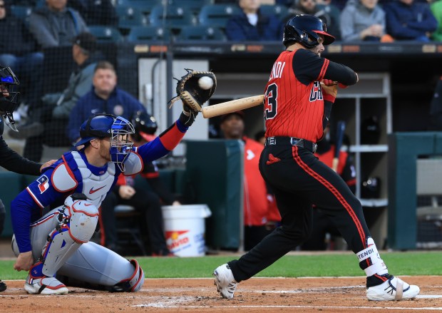White Sox designated hitter Andrew Benintendi takes a ball high in the second inning against the Rangers at Rate Field on May 23, 2025, in Chicago. (John J. Kim/Chicago Tribune)