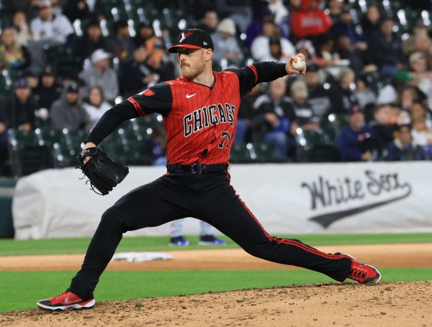 White Sox pitcher Cam Booser throws against the Rangers in the seventh inning at Rate Field on May 23, 2025, in Chicago. (John J. Kim/Chicago Tribune)