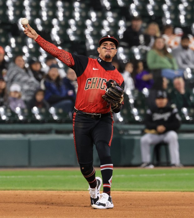White Sox third baseman Josh Rojas throws to first for an out in the ninth inning against the Rangers at Rate Field on May 23, 2025, in Chicago. (John J. Kim/Chicago Tribune)