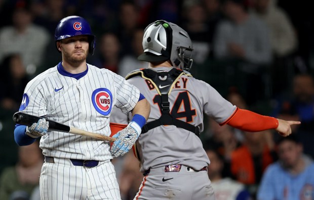 Chicago Cubs outfielder Ian Happ (8) stands at home plate after striking out to end the game in the 11th inning against the San Francisco Giants at Wrigley Field in Chicago on May 6, 2025. (Chris Sweda/Chicago Tribune)