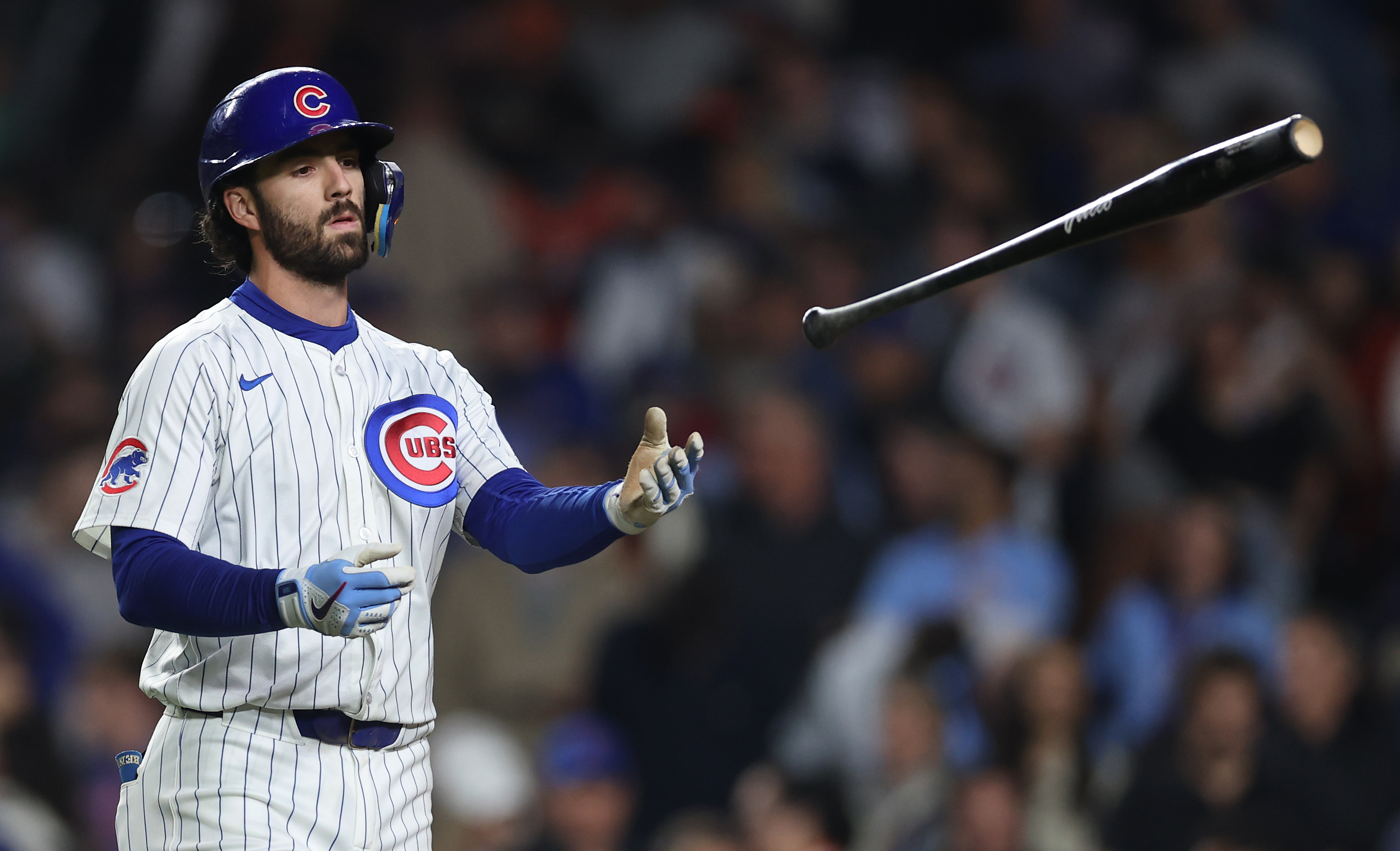 Chicago Cubs shortstop Dansby Swanson (7) tosses his bat aside after lining out to end the 10th inning of a game against the San Francisco Giants at Wrigley Field in Chicago on May 6, 2025. (Chris Sweda/Chicago Tribune)