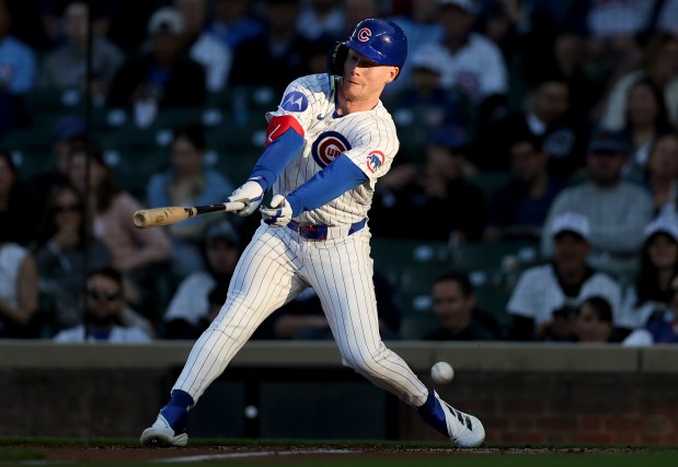 Cubs center fielder Pete Crow-Armstrong swings and misses en route to a strikeout in the second inning against the Marlins on May 14, 2025, at Wrigley Field. (Chris Sweda/Chicago Tribune)