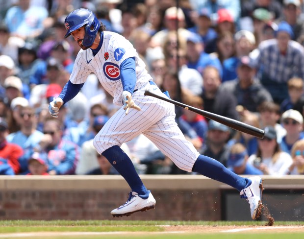 Chicago Cubs shortstop Dansby Swanson drives in a run on a ground out in the first inning of a game against the Colorado Rockies at Wrigley Field in Chicago on May 26, 2025. (Chris Sweda/Chicago Tribune)