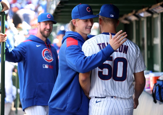 Chicago Cubs starting pitcher Jameson Taillon (50) receives a hug from fellow pitcher Ben Brown after Taillon was pulled from the game in the seventh inning against the Colorado Rockies at Wrigley Field in Chicago on May 26, 2025. (Chris Sweda/Chicago Tribune)