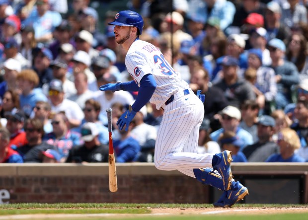 Chicago Cubs outfielder Kyle Tucker sprints to first base as he drives in a run on a single in the fifth inning of a game against the Colorado Rockies at Wrigley Field in Chicago on May 26, 2025. (Chris Sweda/Chicago Tribune)