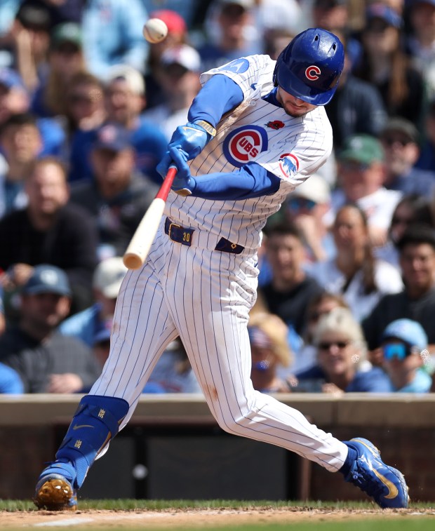 Chicago Cubs outfielder Kyle Tucker drives in a run on a sacrifice fly in the seventh inning of a game against the Colorado Rockies at Wrigley Field in Chicago on May 26, 2025. (Chris Sweda/Chicago Tribune)