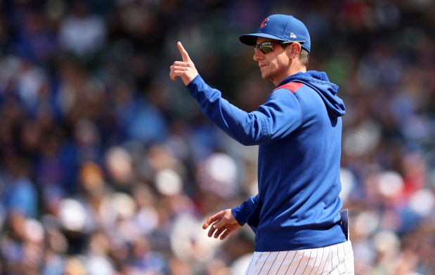 Chicago Cubs manager Craig Counsell calls for a pitching change in the eighth inning of a game against the Colorado Rockies at Wrigley Field in Chicago on May 26, 2025. (Chris Sweda/Chicago Tribune)