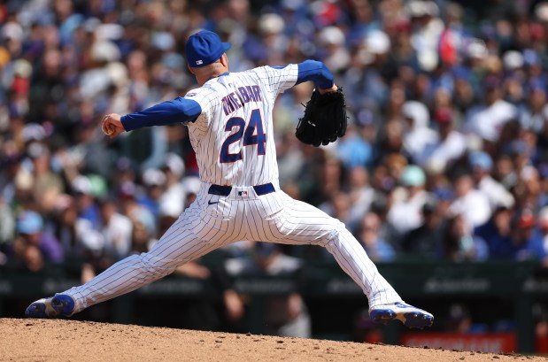 Chicago Cubs relief pitcher Caleb Thielbar (24) delivers to the Colorado Rockies in the seventh inning of a game at Wrigley Field in Chicago on May 26, 2025. (Chris Sweda/Chicago Tribune)