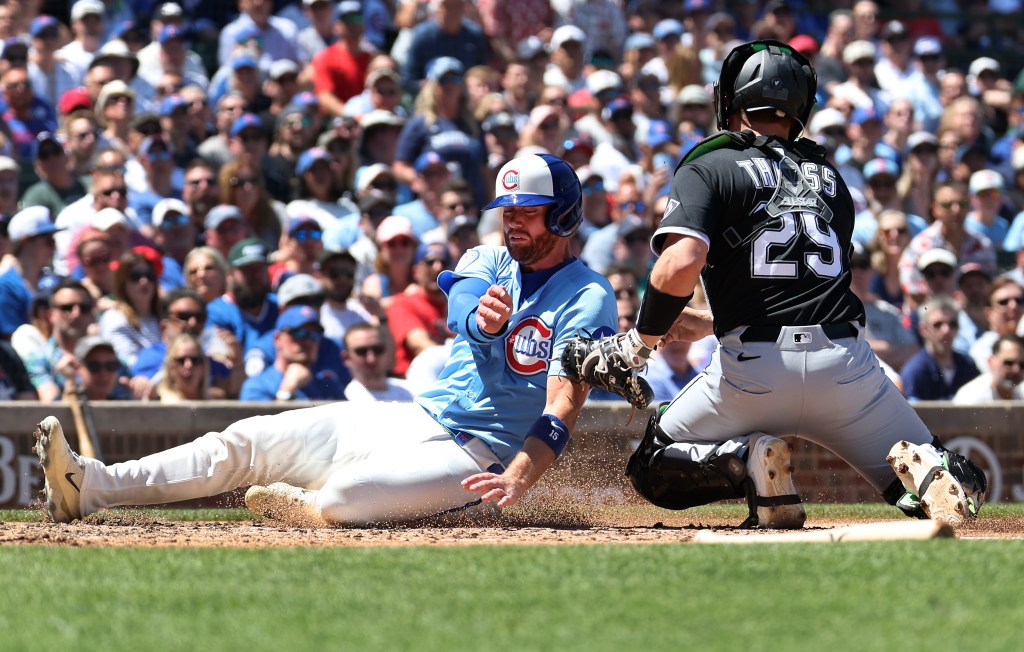 How 2 plays at plate flipped momentum to Cubs