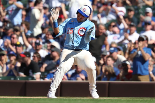 Cubs designated hitter Moisés Ballesteros celebrates after driving in a run with a single in the eighth inning against the White Sox on May 16, 2025, at Wrigley Field. (Chris Sweda/Chicago Tribune)