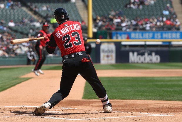 Chicago White Sox outfielder Andrew Benintendi (23) drives in a run on a single in the first inning of a game against the Houston Astros at Rate Field in Chicago on May 3, 2025. (Chris Sweda/Chicago Tribune)