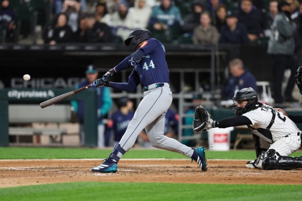 Seattle Mariners outfielder Julio Rodríguez (44) hits a grand slam during the eighth inning against the Chicago White Sox at Rate Field on Monday, May 19, 2025, in Chicago. (Armando L. Sanchez/Chicago Tribune)