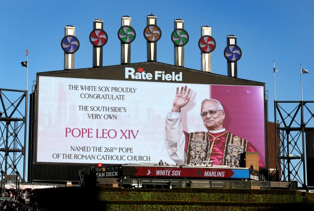 The image of new Pope Leo XIV is cast on the big video board at Rate Field before a White Sox-Marlins game on May 9, 2025. Formerly Cardinal Robert Francis Prevost, the new pope was born in Chicago and raised in Dolton. (Chris Sweda/Chicago Tribune)