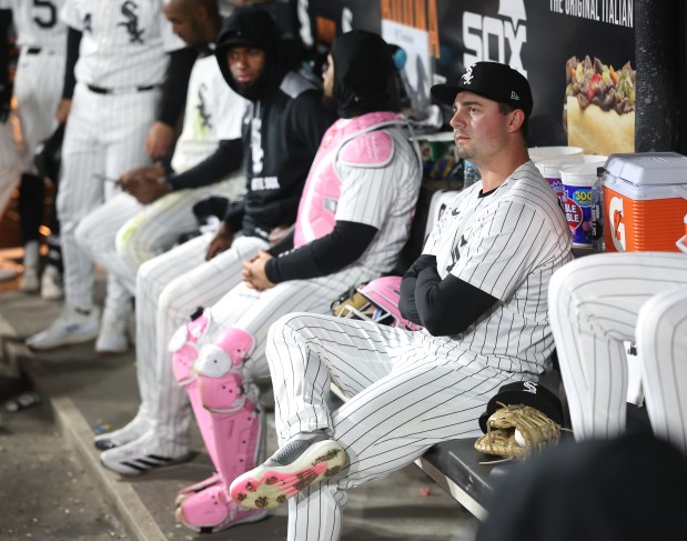 White Sox reliever Brandon Eisert sits in the dugout after the eighth inning against the Marlins on May 10, 2025, at Rate Field. (Chris Sweda/Chicago Tribune)