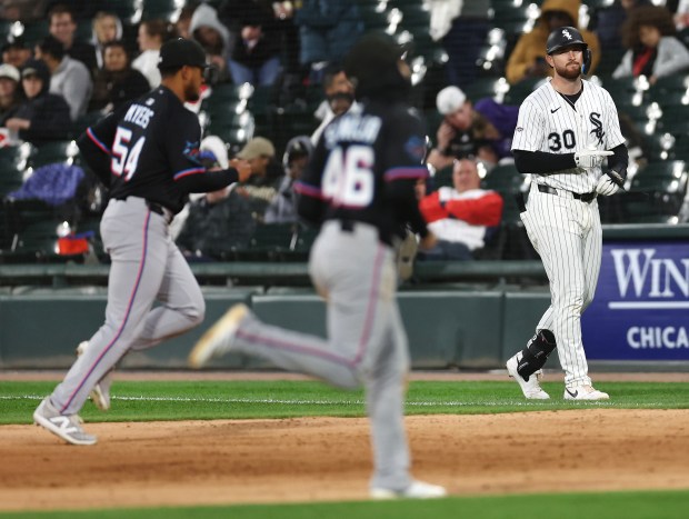 White Sox first baseman Tim Elko, walks back to first after grounding out to end the seventh inning against the Marlins on May 10, 2025, at Rate Field. Elko went 0-for-3 in his major-league debut. (Chris Sweda/Chicago Tribune)