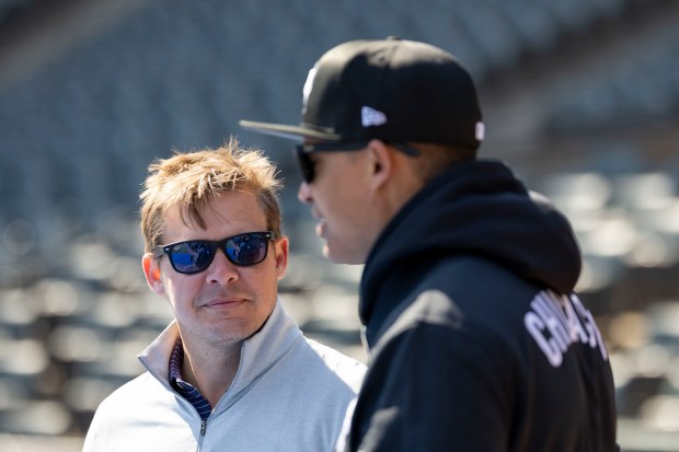 Chicago White Sox general manager Chris Getz and manager Will Venable talk while their team works out Wednesday, March 26, 2025, before Opening Day at Rate Field. (Brian Cassella/Chicago Tribune)