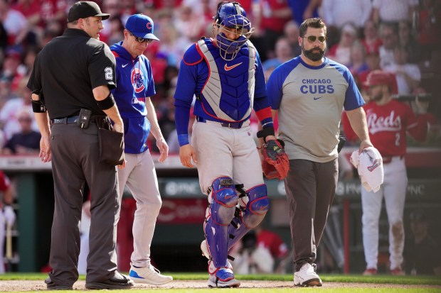 Miguel Amaya #9 of the Chicago Cubs leaves the game after being injured in the fifth inning against the Cincinnati Reds at Great American Ball Park on May 24, 2025 in Cincinnati, Ohio. (Photo by Dylan Buell/Getty Images)
