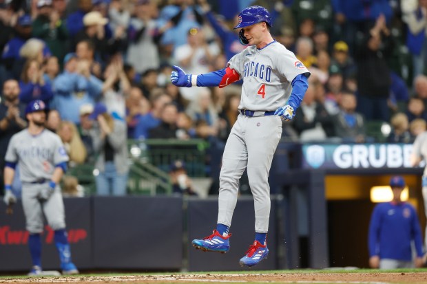 Cubs center fielder Pete Crow-Armstrong hops toward the plate after hitting a three-run home run in the fourth inning against the Brewers on May 3, 2025 in Milwaukee. (John Fisher/Getty Images)