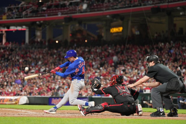 Cubs center fielder Pete Crow-Armstrong hits a grand slam during the seventh inning against the Reds at Great American Ball Park on May 23, 2025, in Cincinnati. (Jeff Dean/Getty Images)