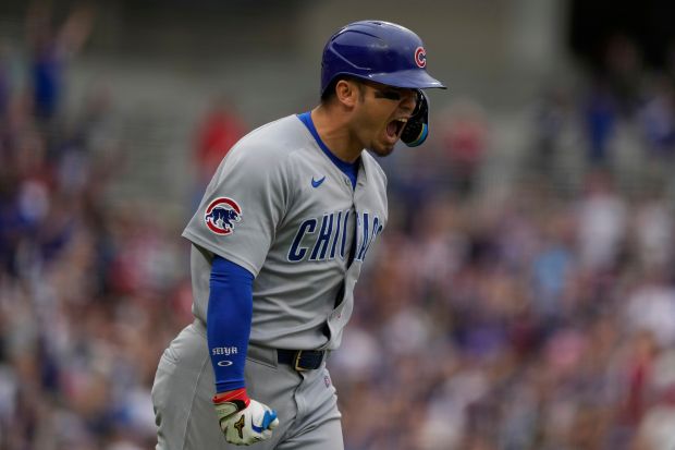 The Cubs' Seiya Suzuki reacts after hitting a three-run home run in the eighth inning against the Reds on Sunday, May 25, 2025, in Cincinnati. (AP Photo/Carolyn Kaster)