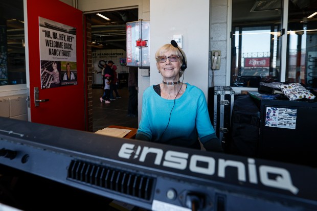 Former longtime Chicago White Sox organist Nancy Faust plays baseball themed music as a part of the White Sox's 125th anniversary celebration before a baseball game against the Miami Marlins, Sunday, May 11, 2025, in Chicago. (AP Photo/Kamil Krzaczynski)