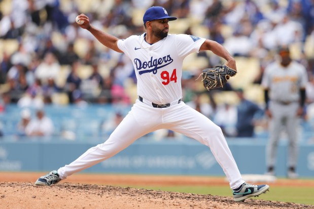 Los Angeles Dodgers pitcher Yoendrys Gómez (94) throws to a Pittsburgh Pirates batter during the seventh inning of a baseball game in Los Angeles, Sunday, April 27, 2025. (AP Photo/Jessie Alcheh)