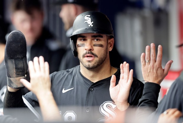 White Sox right fielder Mike Tauchman celebrates in the dugout after scoring a run during the first inning against the Mets at Citi Field on May 28, 2025, in New York. (Jim McIsaac/Getty Images)