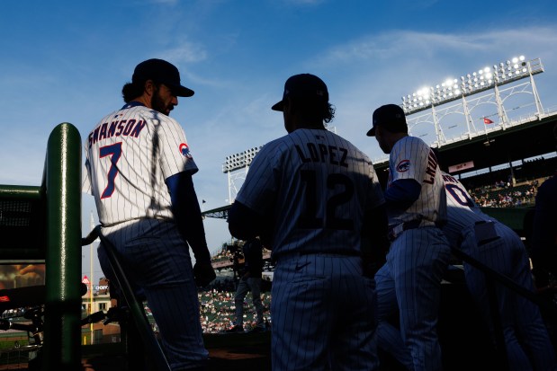 Chicago Cubs shortstop Dansby Swanson (7), Chicago Cubs shortstop Nicky Lopez (12), and Chicago Cubs outfielder Pete Crow-Armstrong (4) wait to take the field before the first inning against the Miami Marlins at Wrigley Field Tuesday May 13, 2025, in Chicago. (Armando L. Sanchez/Chicago Tribune)