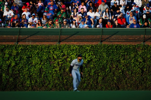 Miami Marlins outfielder Derek Hill (3) stands in the outfield while Chicago Cubs outfielder Pete Crow-Armstrong (4) bats during the third inning at Wrigley Field Tuesday May 13, 2025, in Chicago. (Armando L. Sanchez/Chicago Tribune)