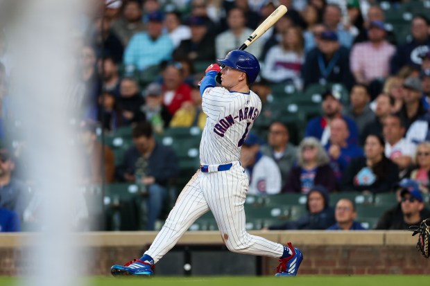 Chicago Cubs outfielder Pete Crow-Armstrong (4) hits a solo-homer during the third inning against the Miami Marlins at Wrigley Field Tuesday May 13, 2025, in Chicago. (Armando L. Sanchez/Chicago Tribune)