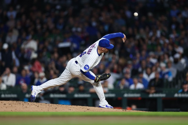 Chicago Cubs pitcher Caleb Thielbar (24) pitches during the sixth inning against the Miami Marlins at Wrigley Field Tuesday May 13, 2025, in Chicago. (Armando L. Sanchez/Chicago Tribune)