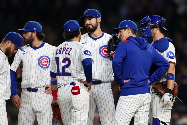 Chicago Cubs manager Craig Counsell (11) takes out Chicago Cubs pitcher Julian Merryweather (66) during the seventh inning against the Miami Marlins at Wrigley Field Tuesday May 13, 2025, in Chicago. (Armando L. Sanchez/Chicago Tribune)