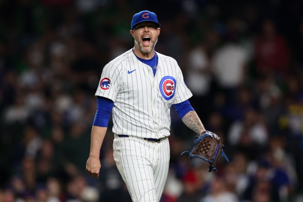Chicago Cubs pitcher Ryan Pressly (55) yells after getting the last out during the seventh inning against the Miami Marlins at Wrigley Field Tuesday May 13, 2025, in Chicago. (Armando L. Sanchez/Chicago Tribune)