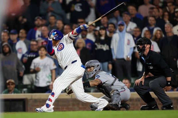 Chicago Cubs pinch hitter Justin Turner (3) hits a walk-off two RBI double to give the Cubs a 5-4 win over the Miami Marlins during the ninth inning at Wrigley Field Tuesday May 13, 2025, in Chicago. (Armando L. Sanchez/Chicago Tribune)