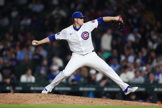 Chicago Cubs pitcher Chris Flexen (77) pitches during the ninth inning against the Miami Marlins at Wrigley Field Tuesday May 13, 2025, in Chicago. (Armando L. Sanchez/Chicago Tribune)