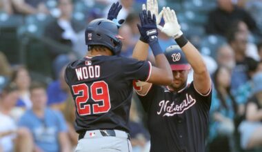 Hassell hits 1st major league homer and Nationals rout Mariners 9-0