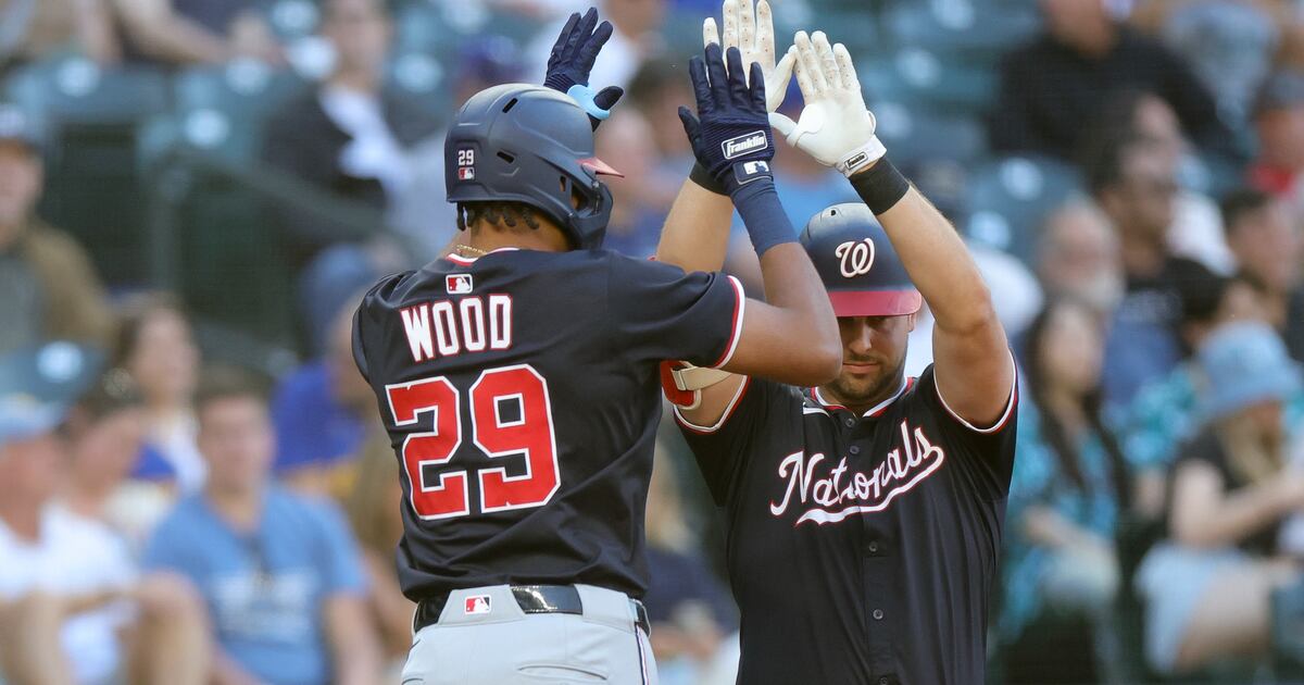 Hassell hits 1st major league homer and Nationals rout Mariners 9-0