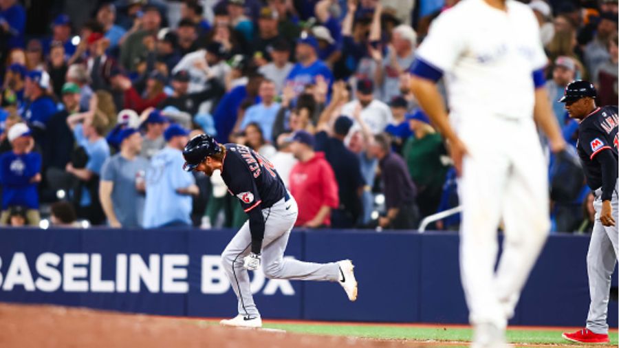 Daniel Schneemann #10 of the Cleveland Guardians grand slam...