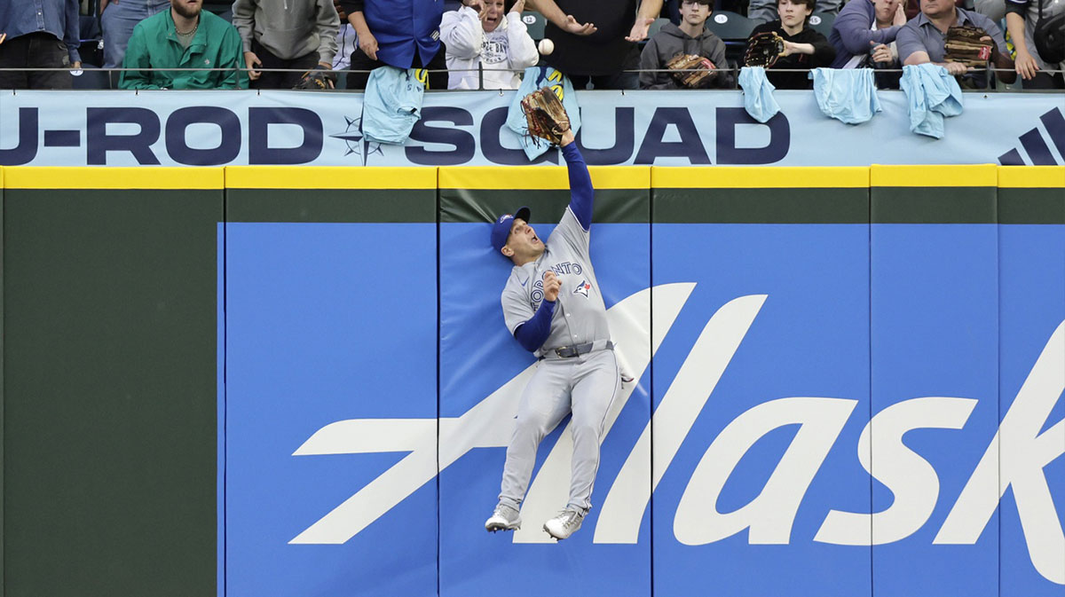 Toronto Blue Jays center fielder Daulton Varsho (5) catches a ball hit by Seattle Mariners third baseman Ben Williamson (not pictured) during the fifth inning at T-Mobile Park. 